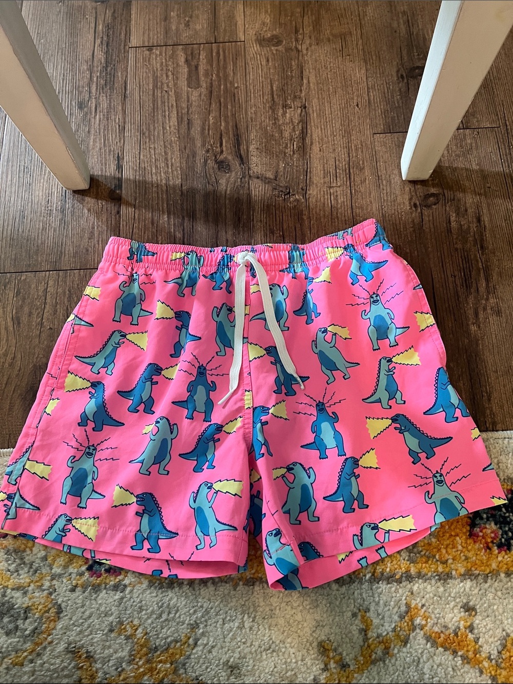 chubbies Kids Pink Swim Trunks with Blue Dinosaur Print